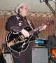 Webb plays his signature Gibson.